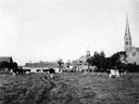 Het land van Korrel met melkfabriek.   Datum opname: 1930